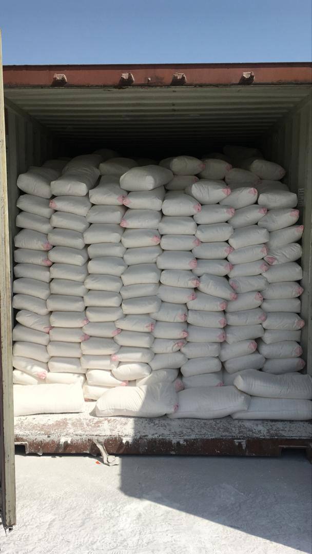 Bags of gypsum in a container